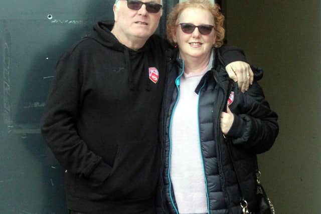 Morecambe kitman Les Dewhirst and wife Debbie before Saturday's win against Burton Albion