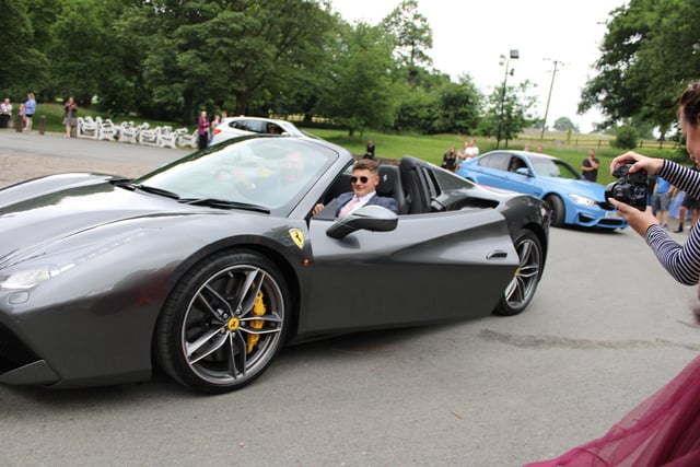 A Lostock Hall Academy pupil arrives in a Ferrari