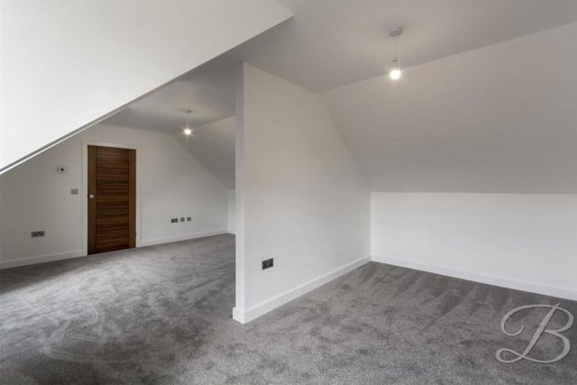 Up the staircase and you will come to this master bedroom, which has a carpeted floor, central heating radiators, double windows to the side of the house and access to an en suite. All four bedrooms have a neutral colour palette with new carpets, making them move-in ready.