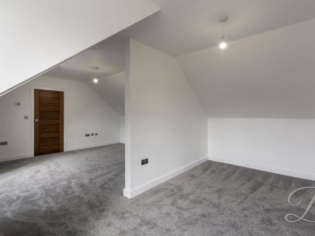 Up the staircase and you will come to this master bedroom, which has a carpeted floor, central heating radiators, double windows to the side of the house and access to an en suite. All four bedrooms have a neutral colour palette with new carpets, making them move-in ready.