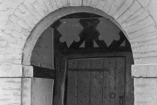This image taken in the 30s or 40s shows one of the entrance doors to old Worden Hall