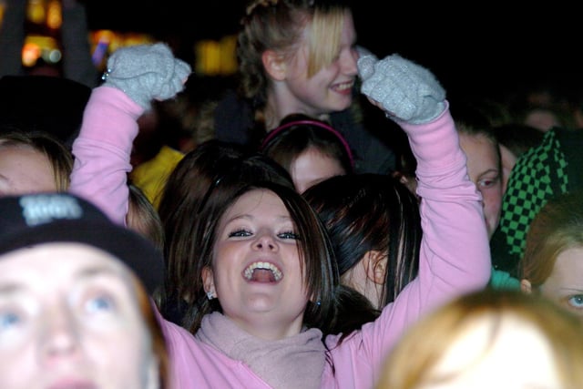 One happy lady at the Preston Christmas lights switch-on event, waiting for the stars to come on stage