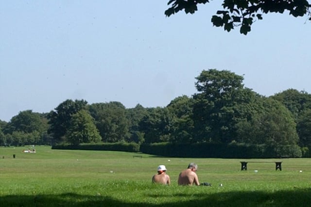 And in 2003 sunbathers relax in the heat at Moor Park, Preston