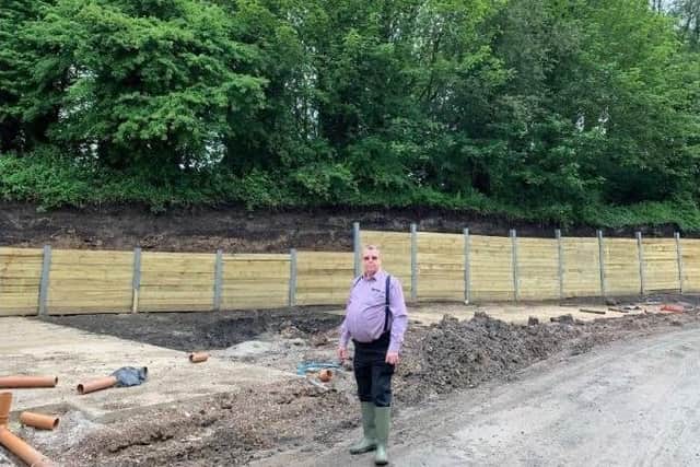 Resident Melvyn Gardner at the embankment excavation site in 2019