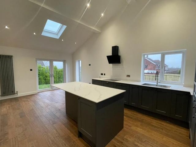 Another shot of the dining kitchen, which shows a pair of French-style doors that lead out into the back garden.