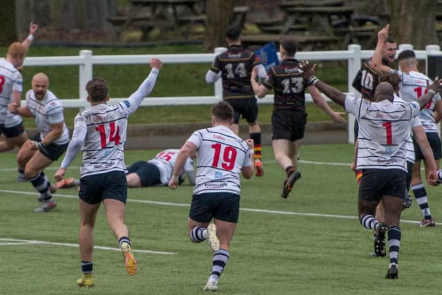 Hoppers celebrate scoring a try in a crucial win over relegation rivals Harrogate at Lightfoot Green (photos: Mike Craig)