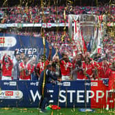 LONDON, ENGLAND - MAY 29: Lewis Grabban of Nottingham Forest lifts the trophy following the Sky Bet Championship Play-Off Final match between Huddersfield Town and Nottingham Forest at Wembley Stadium on May 29, 2022 in London, England. (Photo by Christopher Lee/Getty Images)