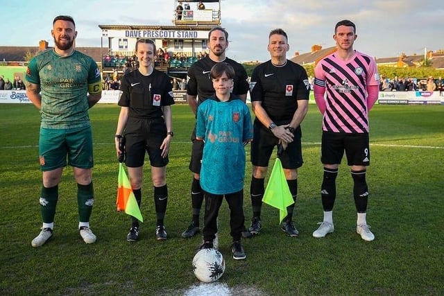 Vinnie pictured with team members.