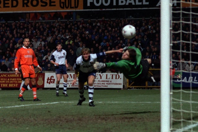David Reeves heads PNE's second goal against Blackpool in December 1996. The game was dubbed 'the Night of Shame' after more than 70 arrests were made