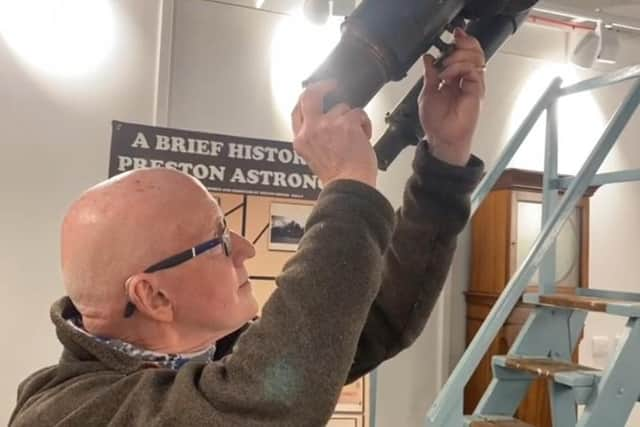 Dermot Gethings with the Observatory telescope. Photo: Freya Taylor.