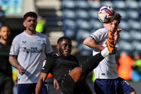 Stoke’s Junior Tchamadeu battles with PNE’s Ryan Ledson (photo: Alex Dodd/CameraSport)