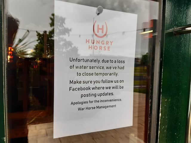 Message on the door of the War Horse, in Buckshaw village, Chorley, today