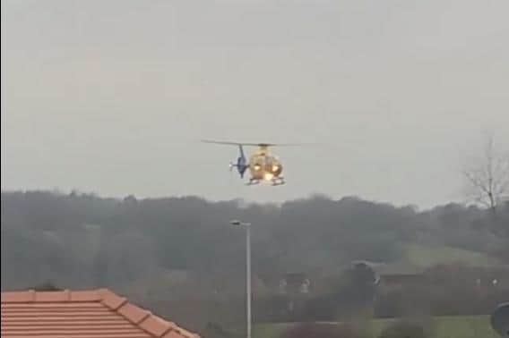 The helicopters touched down on the playing fields at around 3.30pm and onboard paramedics rushed to a home in nearby Draperfield. Pic credit: Laura Johnson