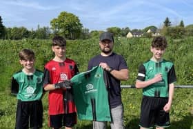 Pendle Forest Raptors players present Andrew Sunter (Marsden Building Society) with club shirt