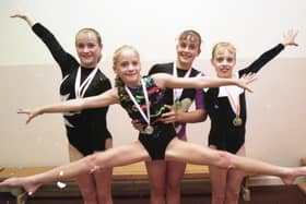 A team of gymnasts proved they had the right balance to win a string of awards in the North West Individual Championships. Five members of the Garstang School of Gymnastics competed in Liverpool against hundreds of other hopefuls. Pictured: Lisa Pendlebury, 10, gets a lift from fellow gymnasts (left to right) Francesca Cookson, from Lea, Preston; Emma Nichlson, 15, from Blackpool; and Amy Burke, 12, from St Michaels
