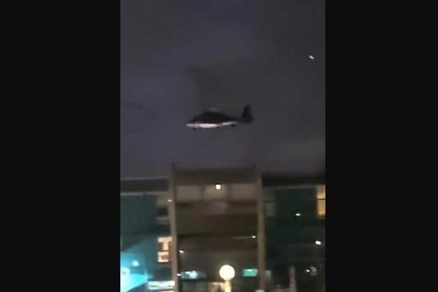 The SAS helicopters were seen circling low over rooftops with no lights on before landing on the roof of the college in Blackpool Old Road at around 8pm