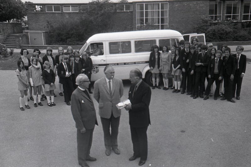 Mr Robert Foster, managing director of Bradshaws, hands over the keys of a brand new mini bus to headmaster Mr Thomas Boak, watched by eager pupils of Fulwood High School. The mini bus meant that eight pupils and staff members were able to set off to Norway, to take part in an education adventure