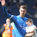 Paul Huntington with his daughter after playing his last game for Preston North End