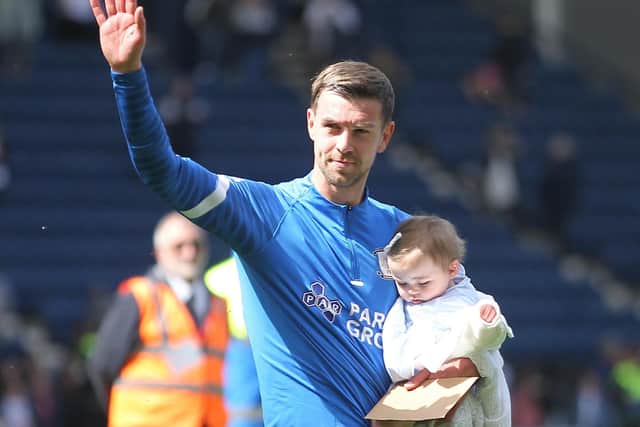 Paul Huntington with his daughter after playing his last game for Preston North End