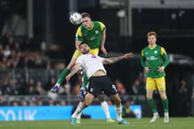 Preston North End defender Liam Lindsay gets above Fulham's Aleksandar Mitrovic at Craven Cottage