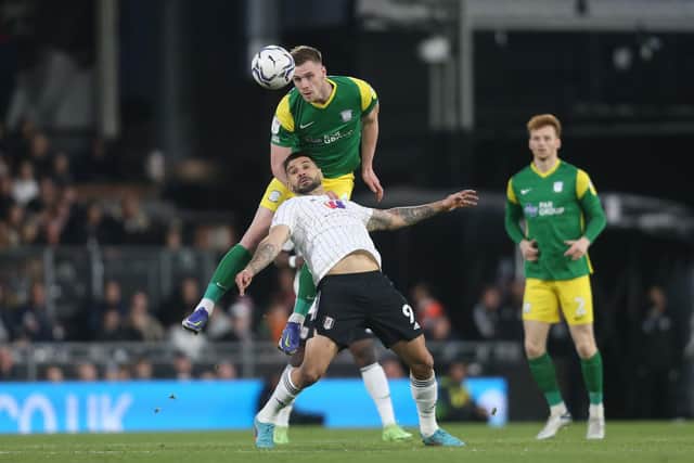 Preston North End defender Liam Lindsay gets above Fulham's Aleksandar Mitrovic at Craven Cottage