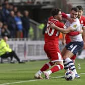 Middlesbrough's Hayden Hackney is challenged by Preston North End's Ben Whiteman