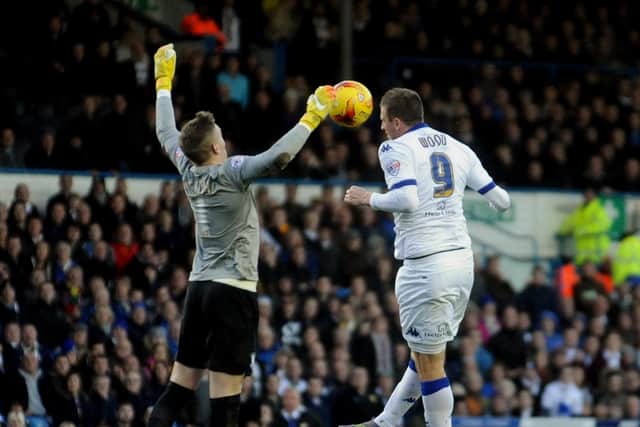 Jordan Pickford challenges Leeds United striker Chris Woods which led to his red card
