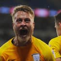 Preston North End's Tom Clarke celebrates scoring.