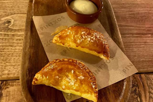 Course 1: Empanadllas Gallega - Traditional Spanish baked turnover, filled with savory vegetables. This dish was partnered with Nuviana Cabernet.