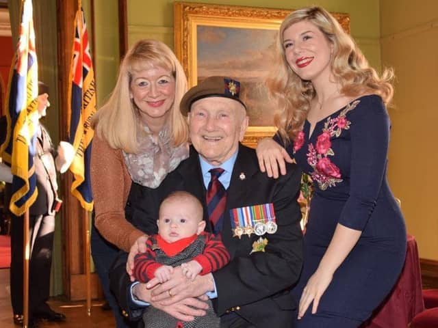 Padiham's Scots Guards veteran Ted Davidson with his adopted family Maureen and Grace O'Malley from Rawtenstall