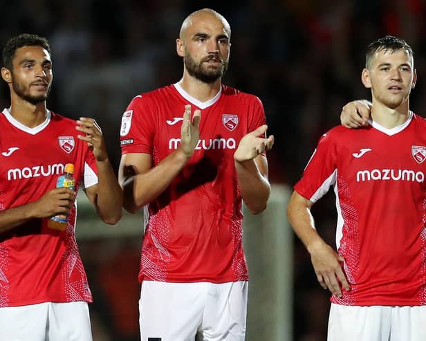 l-r: Max Melbourne, Farrend Rawson and Donald Love are three of the Morecambe players under contract Picture: Lewis Storey/Getty Images