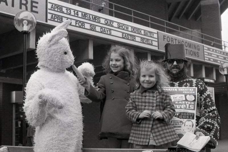 Jane and Janet Boyd, of Morecambe, are greeted by an Easter bunny - publicity for a special Easter Revels show being presented at Preston's Charter Theatre