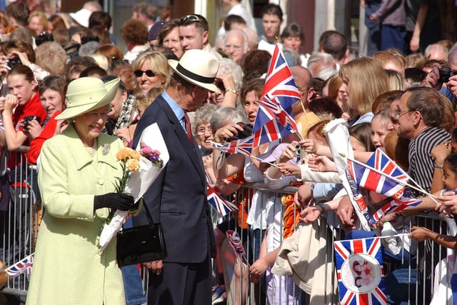 The Queen and Prince Philip meet the crowds during their visit to Preston 20 years ago in 2002