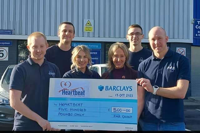 PAR Group staff handing over the cheque to Karen Entwistle, Heartbeat’s Corporate Fundraiser