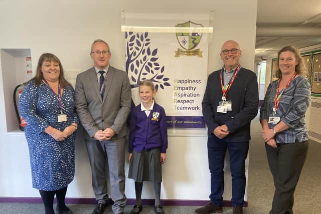 Year 5 pupil Hannah with Christine Adams (Executive Head), Mark Cunniffe (Head of School), Mike Titherington and Jo Beaman (Climate Emergency Engagement Officer - South Ribble).