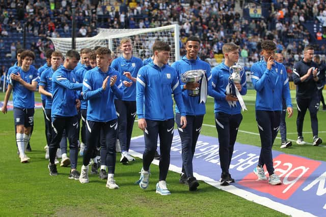 Preston North End's youth team parade their trophies at half-time of the Middlesbrough game at Deepdale