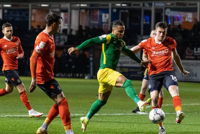 Preston North End striker Cameron Archer takes on Luton Town's Reece Burke