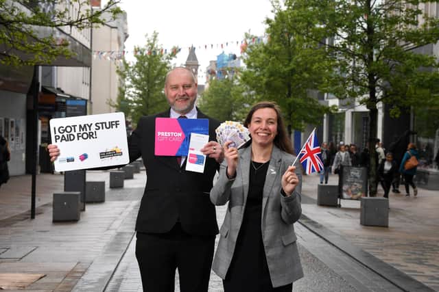 Preston BID to give away £28,000 to local customers over the jubilee bank holiday weekend, pictured are Catherine Lawrenson and Mike Pixton of Preston BID.