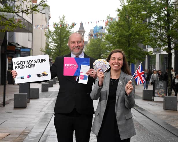 Preston BID to give away £28,000 to local customers over the jubilee bank holiday weekend, pictured are Catherine Lawrenson and Mike Pixton of Preston BID.