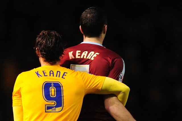 Preston North End's Will Keane, left, holds onto his brother Burnley's Michael Keane.