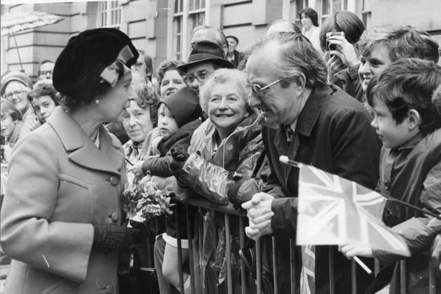 More eager faces in the crowd as the Queen makes her way along the waiting crowds in 1979