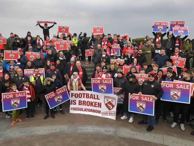 Morecambe fans made their views known about the ownership situation earlier this year Picture: Neil Cross