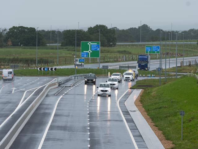 The first vehicles travel on the Preston Western Distributor link road after its opening