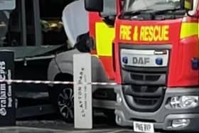 Police and fire crews were called to the Shell petrol station at the junction of Brownedge Road and Todd Lane South in Lostock Hall after a car collided with the SPAR shop front at around 9.30am on Wednesday, October 10