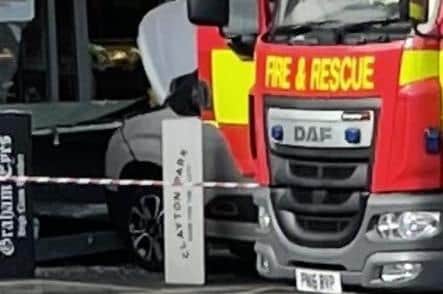 Police and fire crews were called to the Shell petrol station at the junction of Brownedge Road and Todd Lane South in Lostock Hall after a car collided with the SPAR shop front at around 9.30am on Wednesday, October 10