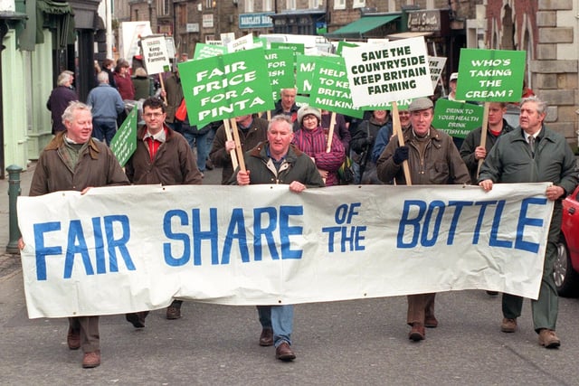Farmers march through Garstang during a protest for their 'Fair share of the bottle'