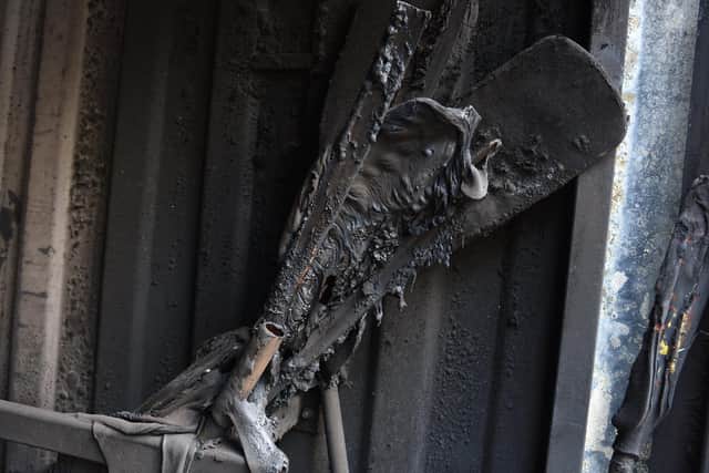 Photo Neil Cross; The remains of kayaks and canoes at Euxton Canoe Club following an arson attack