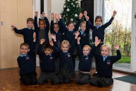 Pupils from St Bede's Catholic Primary School celebrate a good Ofsted rating.
