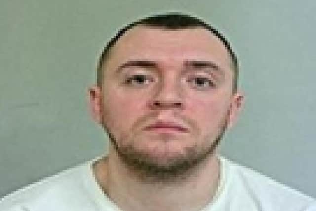 Jake Johnston, 26, from Preston, is wanted in connection with an aggravated burglary and assault on September 20 (Credit: Lancashire Police)