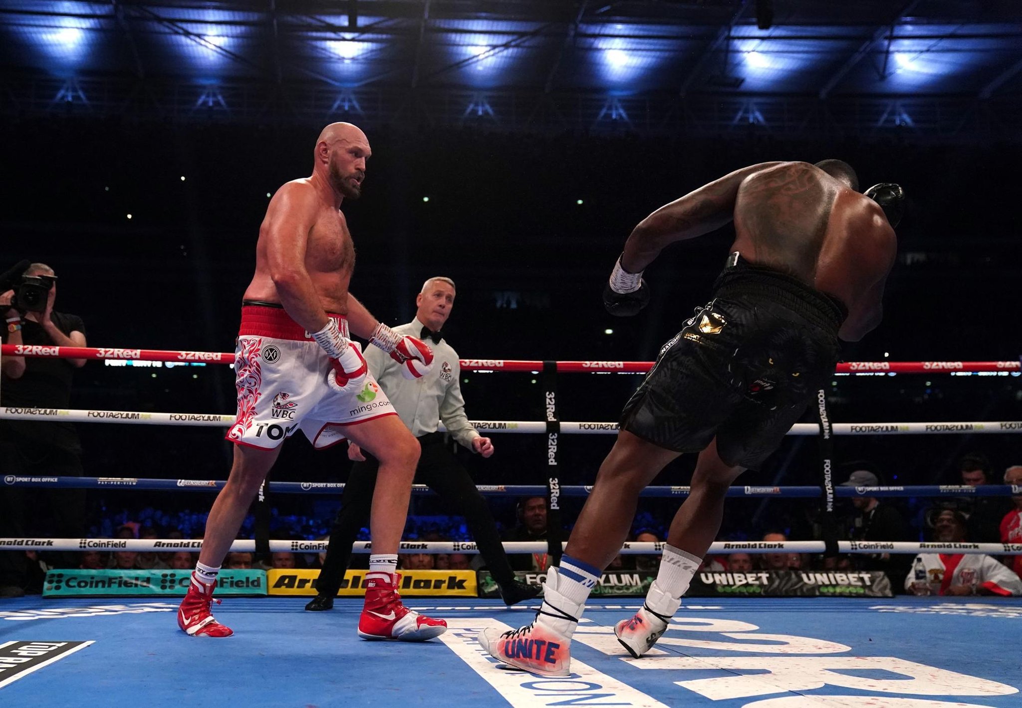 Tyson Fury dominates and stops Dillian Whyte for glorious Wembley homecoming